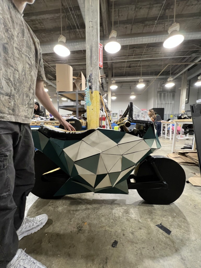 User testing the foam core motorcycle