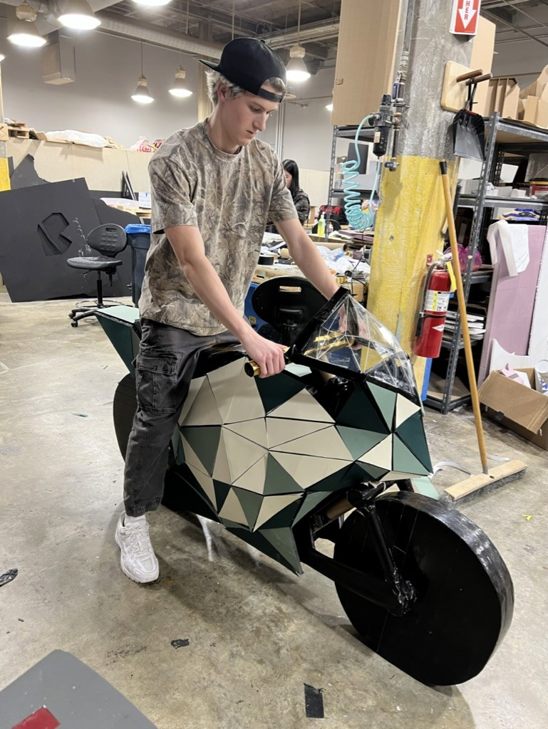 User testing the foam core motorcycle